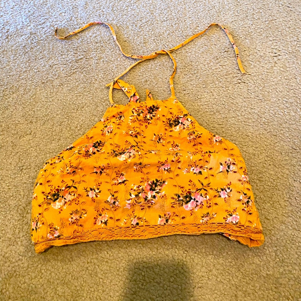 floral pattern crop top. ties in the back and neck